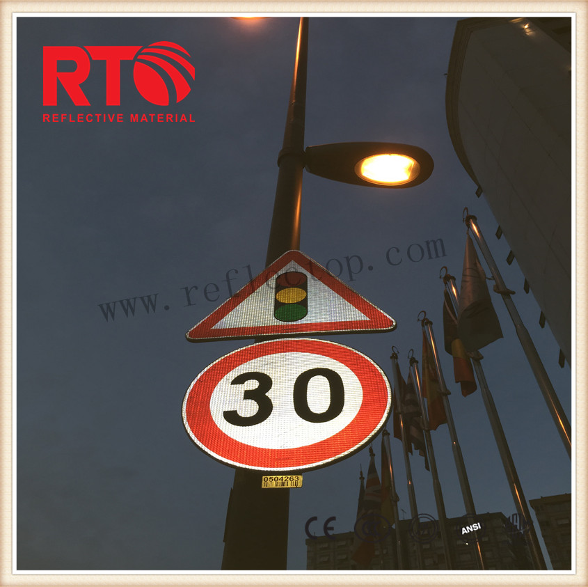 Reflective sheet for road signs