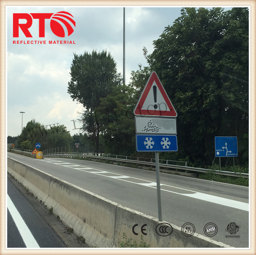 Commercial grade reflective film for temporary road signs