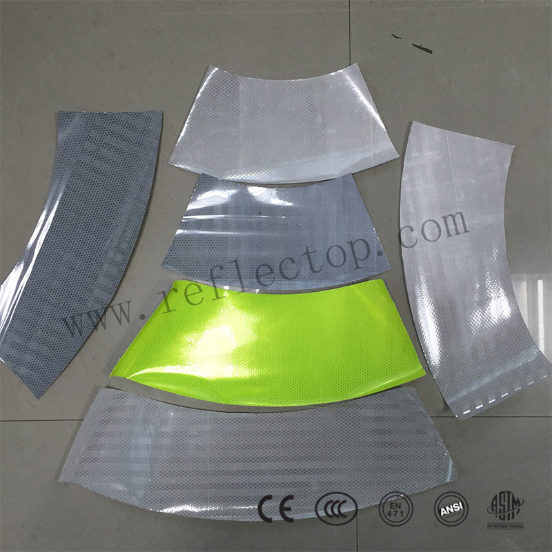 Prismatic reflective film for cone sleeve